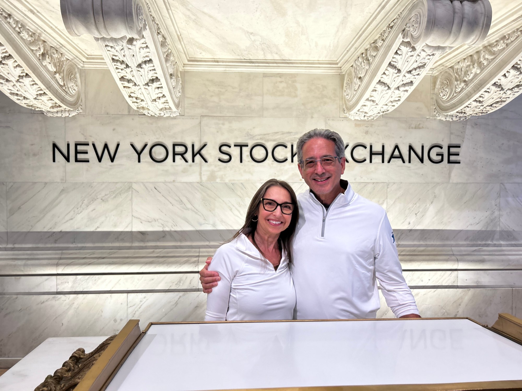 Luis Machado and his wife at the New York Stock Exchange.